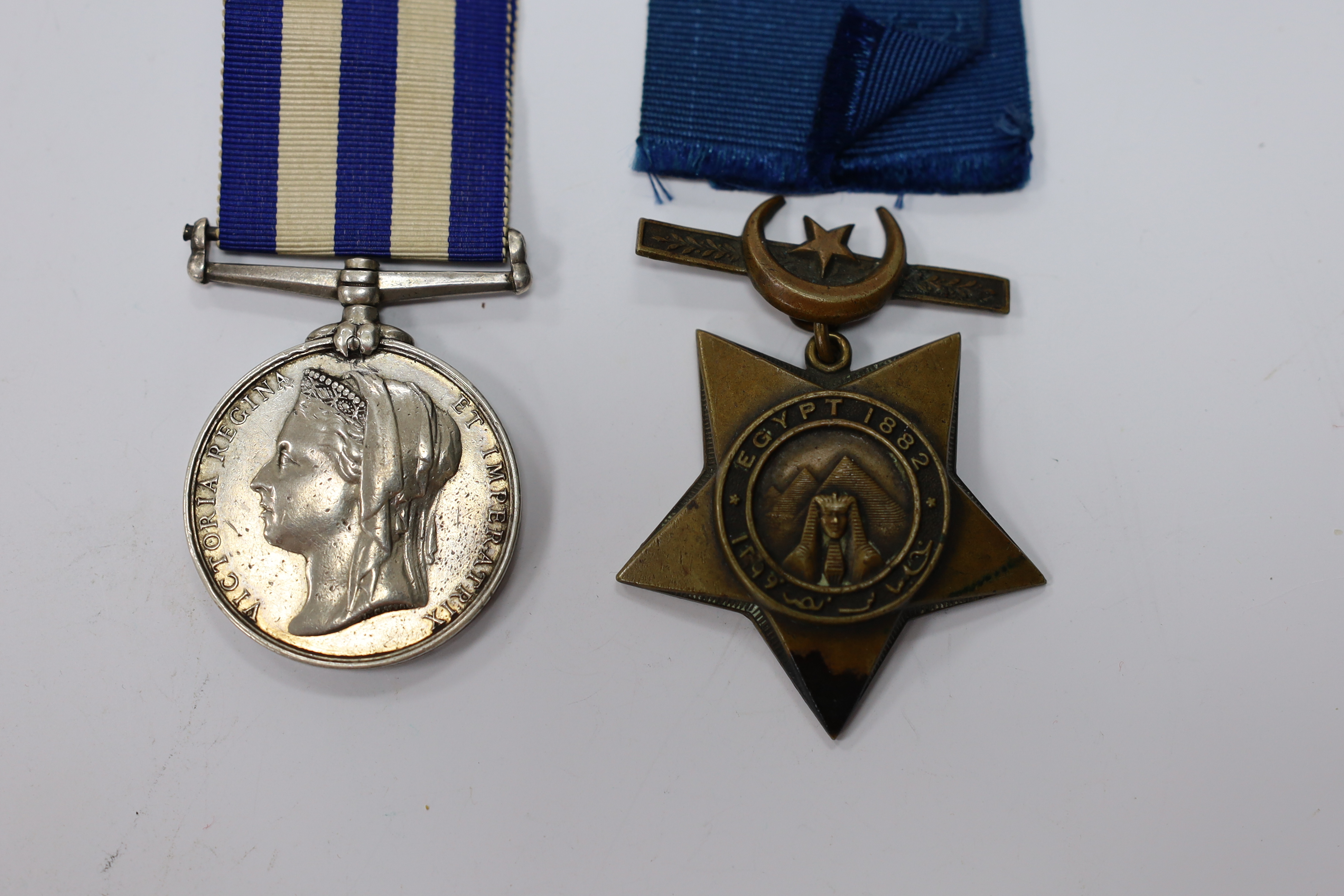 An Egypt Medal 1882-89 to 2636 Pte R.Hopwood. 2/Derby,R. and a Khedive's Star 1882.